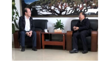 来宾市委书记农生文与幸运传世董事长王双飞座谈交流环保合作